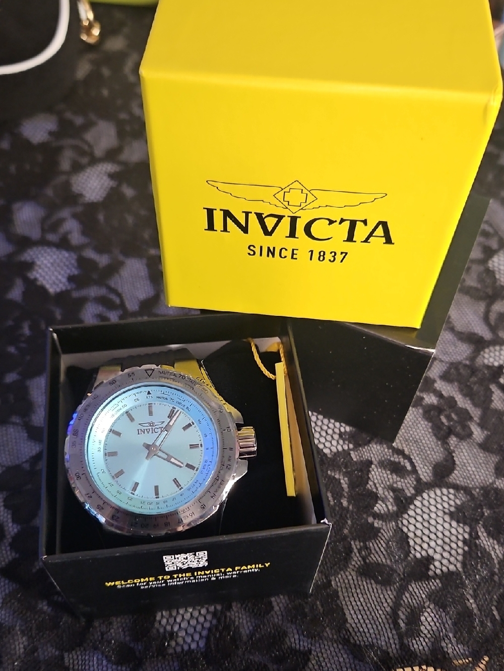 Invicta Men's Silver Watch with Light Blue Dial
